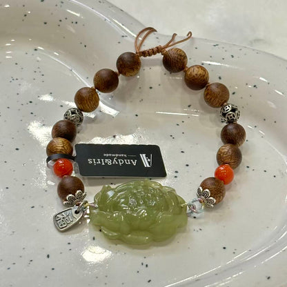finely carved Hetian jade pendant, combined with silver, Nanhong agate, and fragrant wood