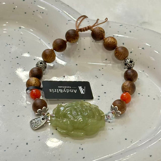 finely carved Hetian jade pendant, combined with silver, Nanhong agate, and fragrant wood