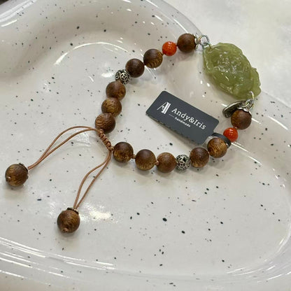 finely carved Hetian jade pendant, combined with silver, Nanhong agate, and fragrant wood