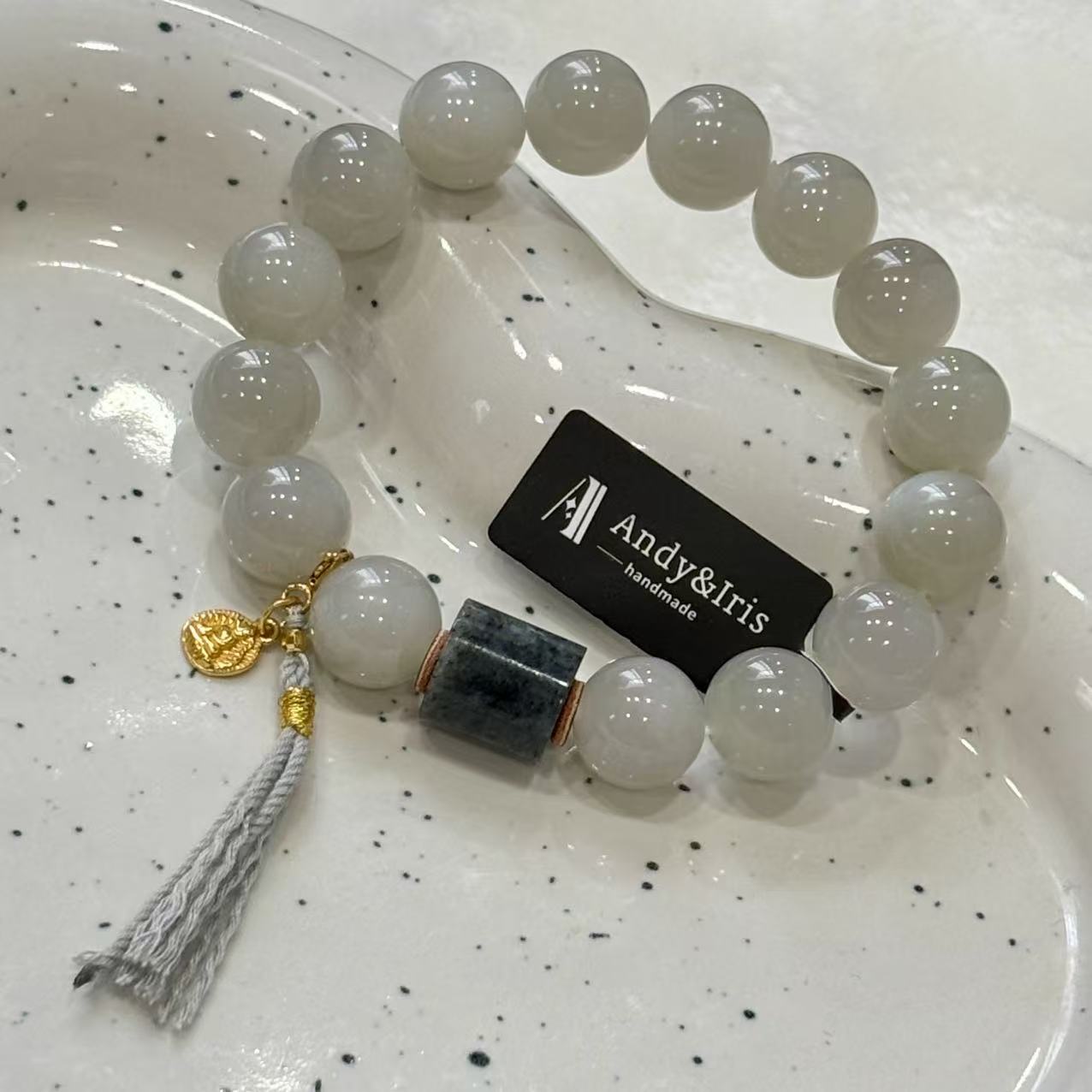 grey-toned Hetian white jade with black jade